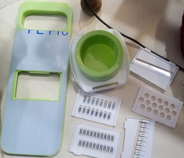 "Multifunctional Stainless Steel Vegetable Cutter: Slicer, Shredder, Peeler, and More!"